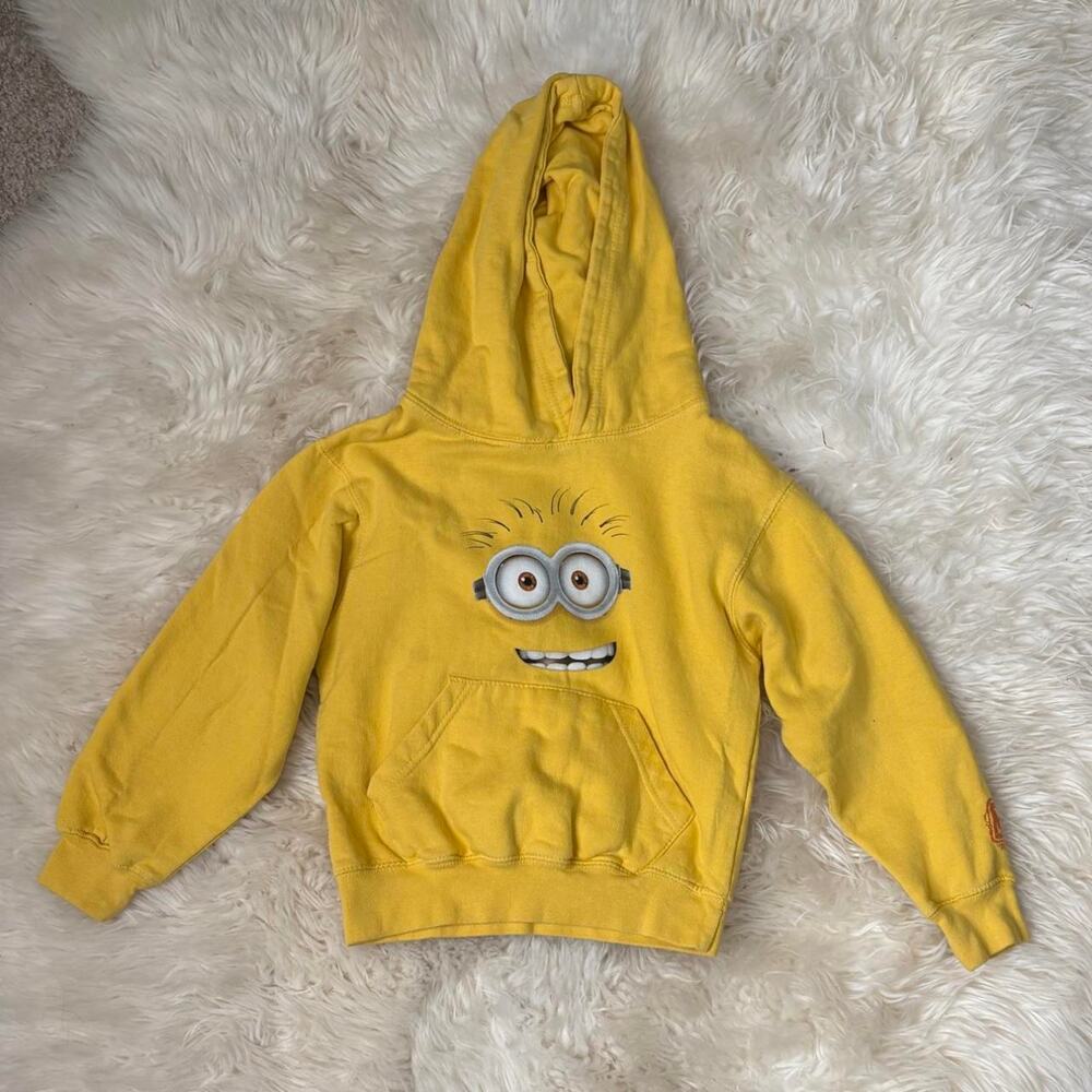 Universal Studios Minion hoodie with graphic of a Minion's face  size youth xs